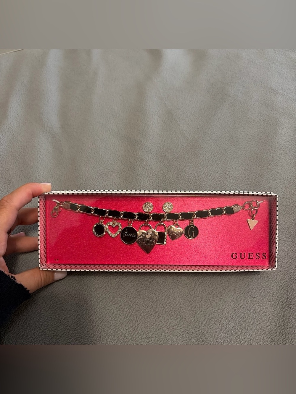 GUESS charm bracelet and earrings
